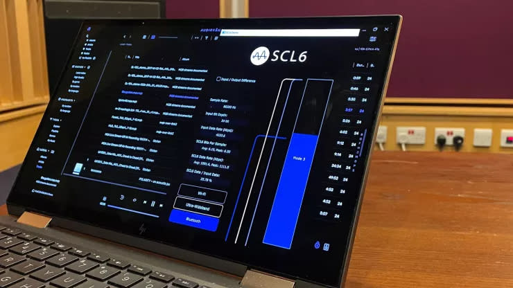 A laptop displaying an SCL6 demo