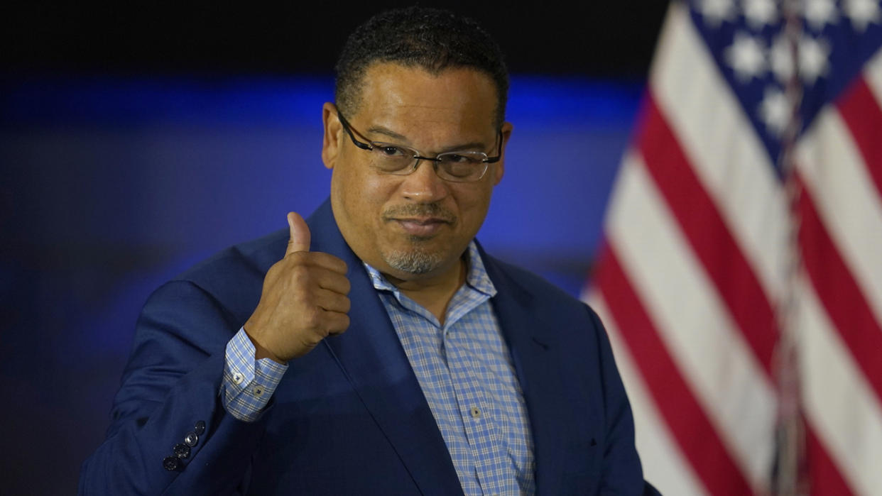 Minnesota Attorney General Keith Ellison acknowledges the crowd after a speech in October. 