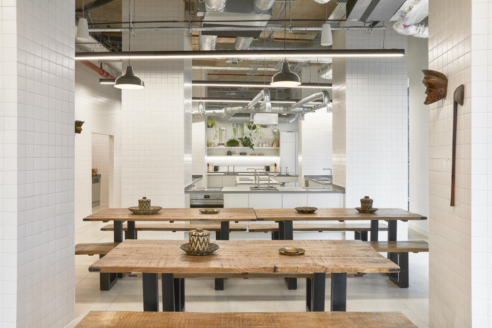 The Collective Canary Wharf communal kitchen is featured in this photo.