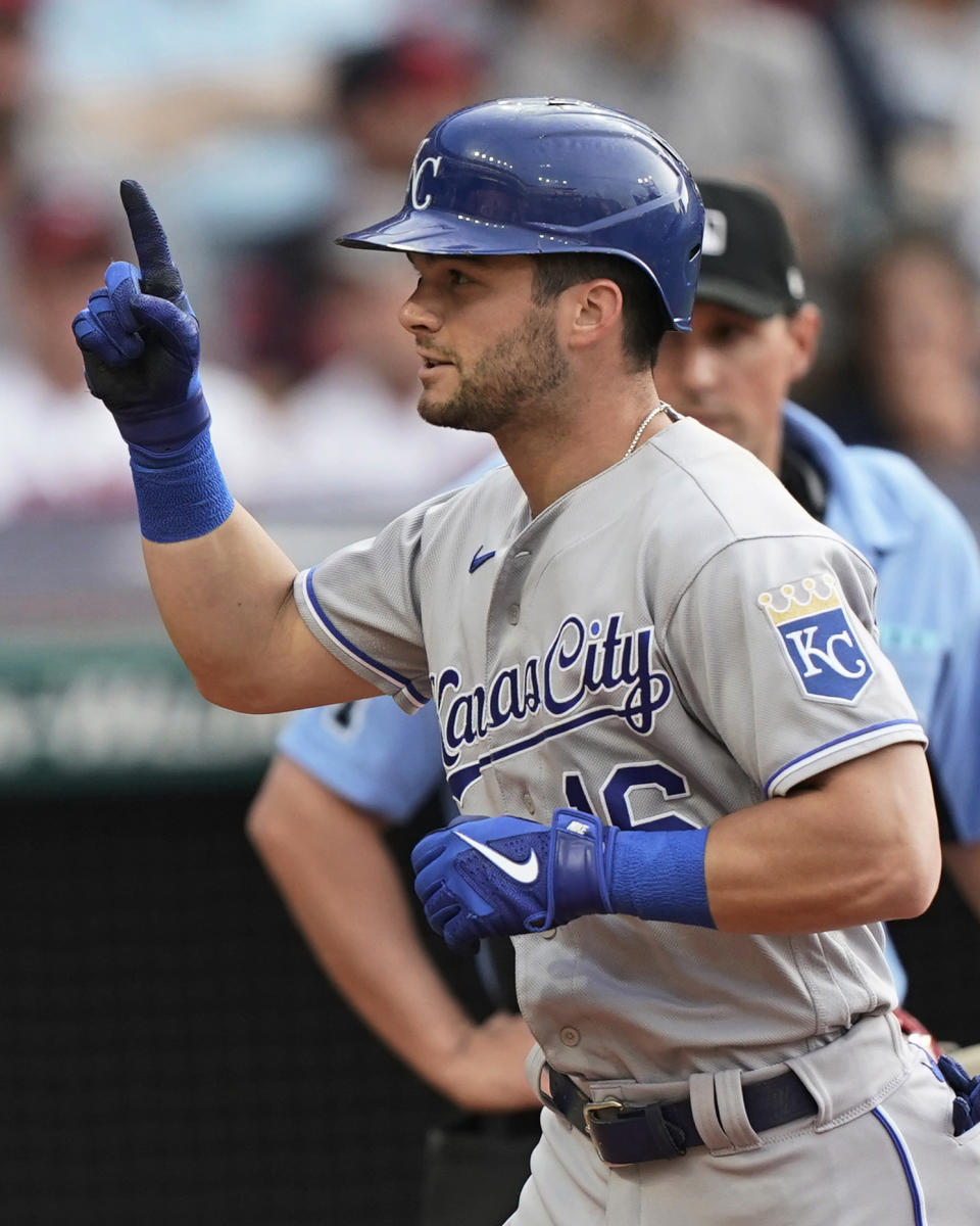Kansas City Royals' Andrew Benintendi points up after hitting a solo home run during the sixth inning of the team's baseball game against the Cleveland Indians, Saturday, July 10, 2021, in Cleveland. (AP Photo/Tony Dejak)
