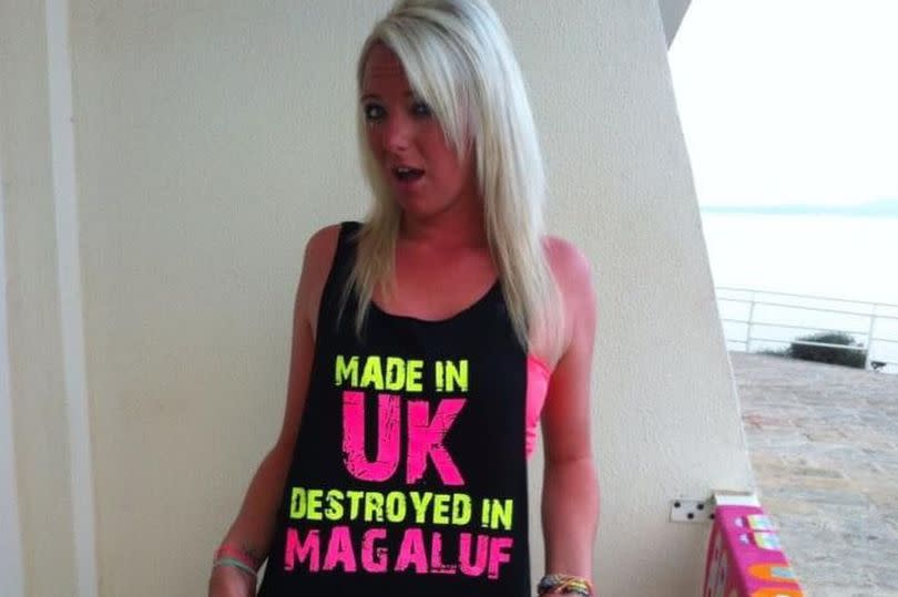 A sunburnt blonde woman in a top that reads 'Made in UK, destroyed in Magaluf