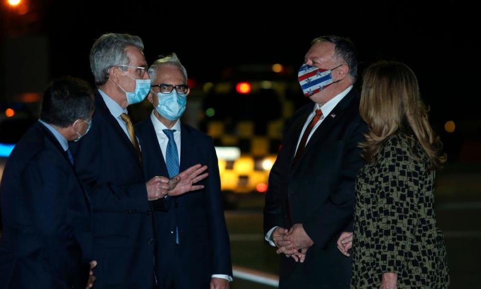 The US secretary of state, Mike Pompeo, second right, is welcomed by the US ambassador to Greece, Geoffrey Pyatt, second left, in the northern city of Thessaloniki, Greece, on 28 September.