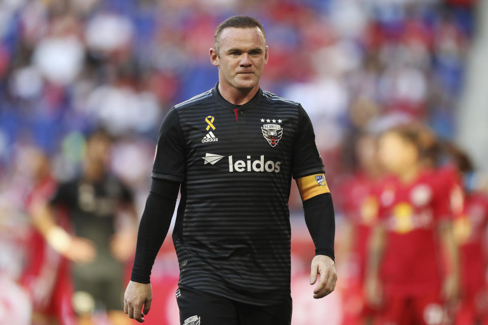 Former D.C. United star Wayne Rooney isn't a fan of Major League Soccer's trade and transfer system. (AP Photo/Steve Luciano/AP)