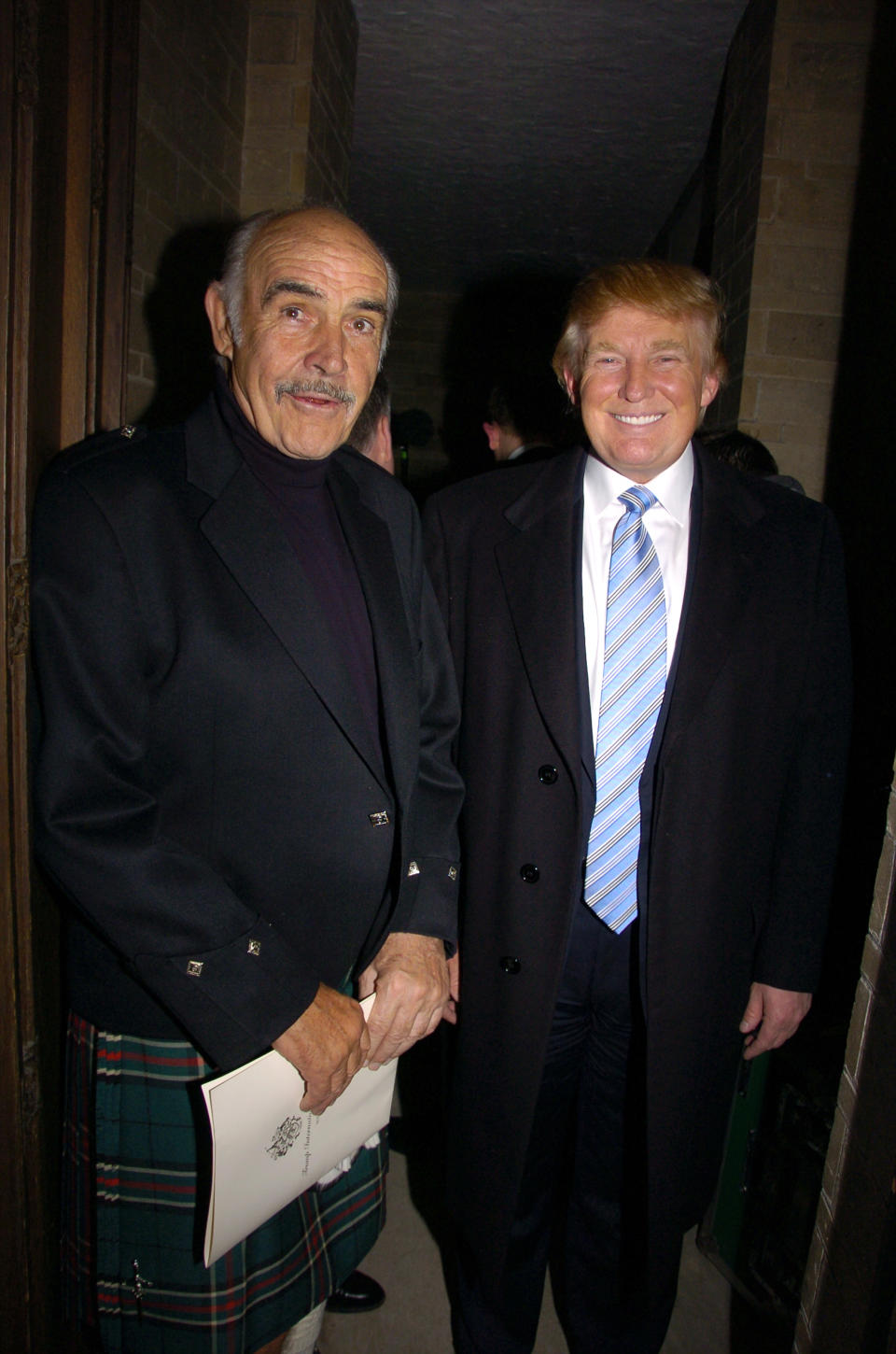 UNITED STATES - APRIL 03:  Sean Connery (left) and Donald Trump are at the Synod House at St. John the Divine Cathedral Garden for the Johnnie Walker Dressed to Kilt fashion show and charity event.  (Photo by Richard Corkery/NY Daily News Archive via Getty Images)