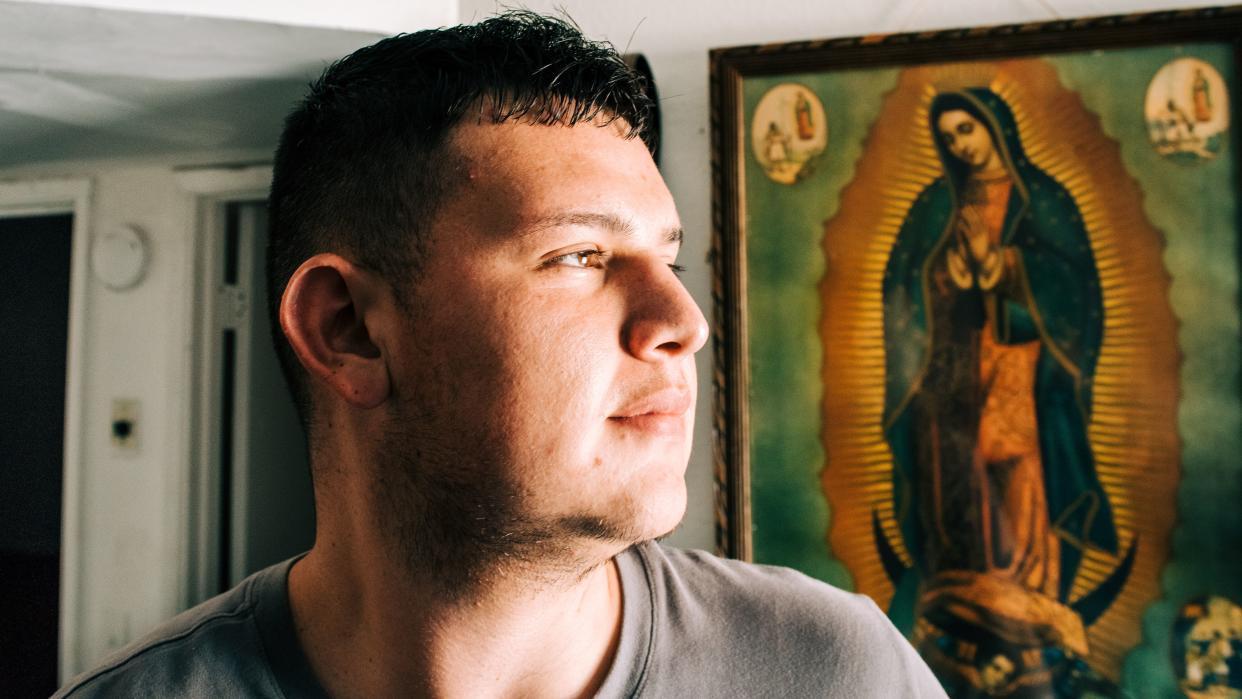 Angel Mendivil Perez stands briefly under his own power, getting a look outside at his sister&rsquo;s house in Tucson, Arizona on August 12, 2019. (Photo: Ash Ponders for HuffPost)