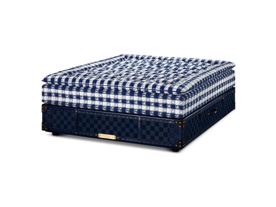 blue check mattress on a blue woven base