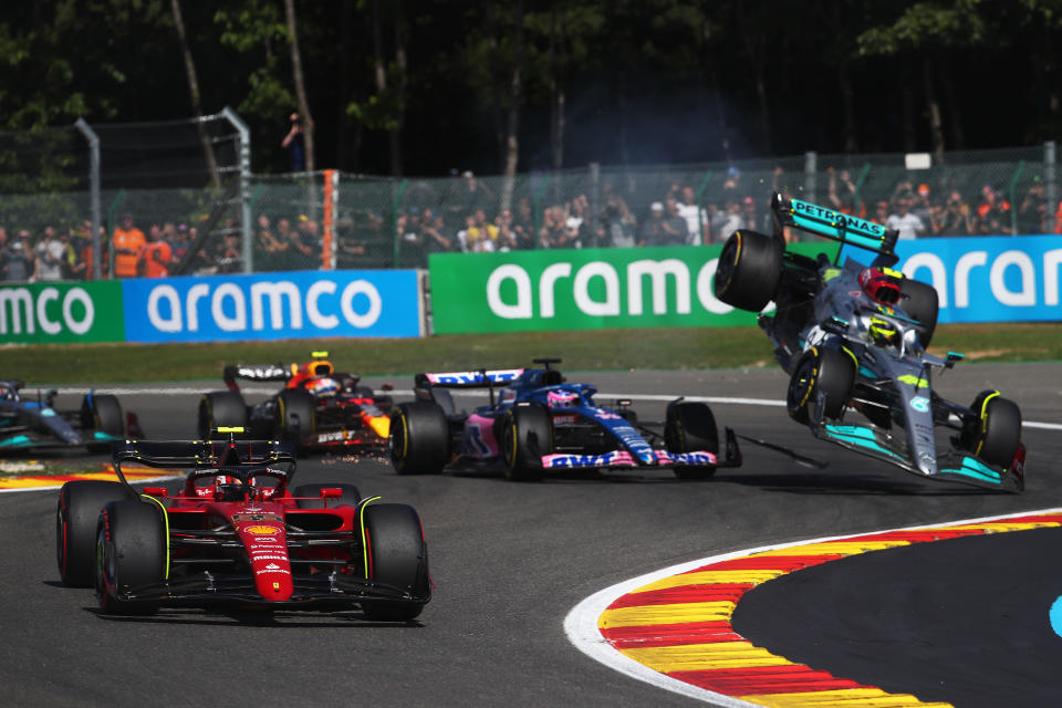 Lewis Hamilton goes airborne after a crash with Fernando Alonso at the Belgium F1 Grand Prix.