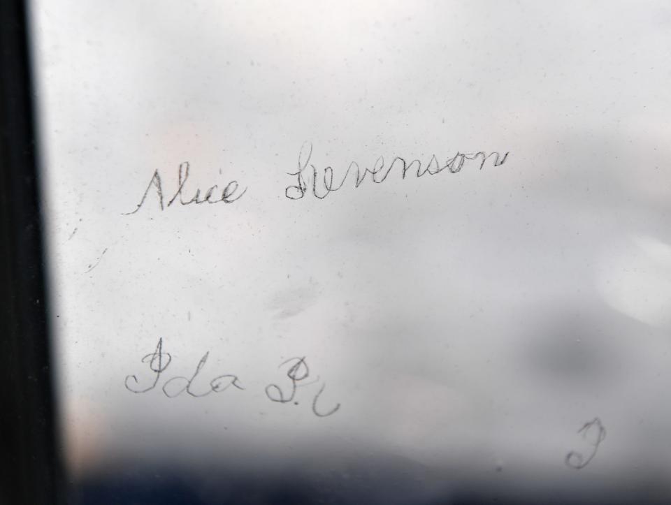Etchings on the window pane in the green room with the signatures of three sister at Chanceford Hall Inn Bed & Breakfast.
