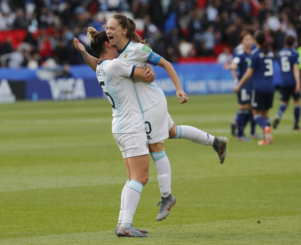 Argentina's Aldana Cometti, left, and Argentina's Estefania Banini react at the end Women's World Cup Group D soccer match between Argentina and Japan at the Parc des Princes in Paris, France, Monday, June 10, 2019. (AP Photo/Thibault Camus)