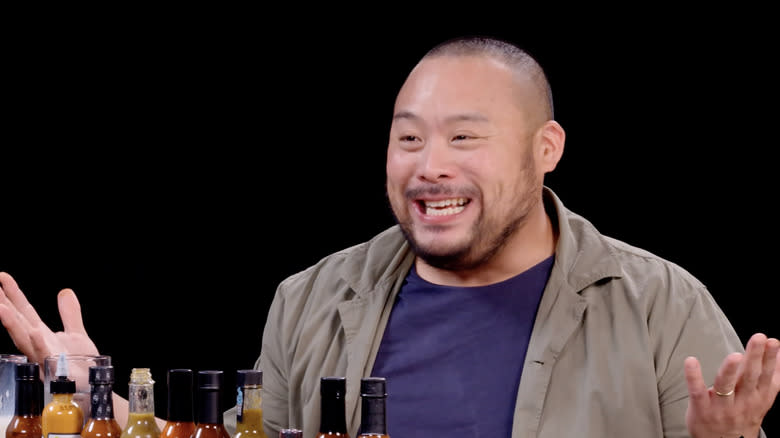 David Chang laughing with hands