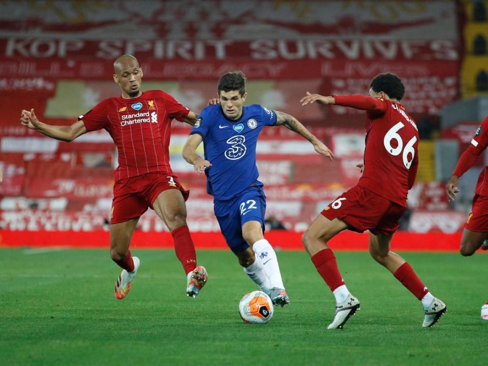 Pulisic dribbles past Fabinho and Alexander-Arnold: POOL/AFP