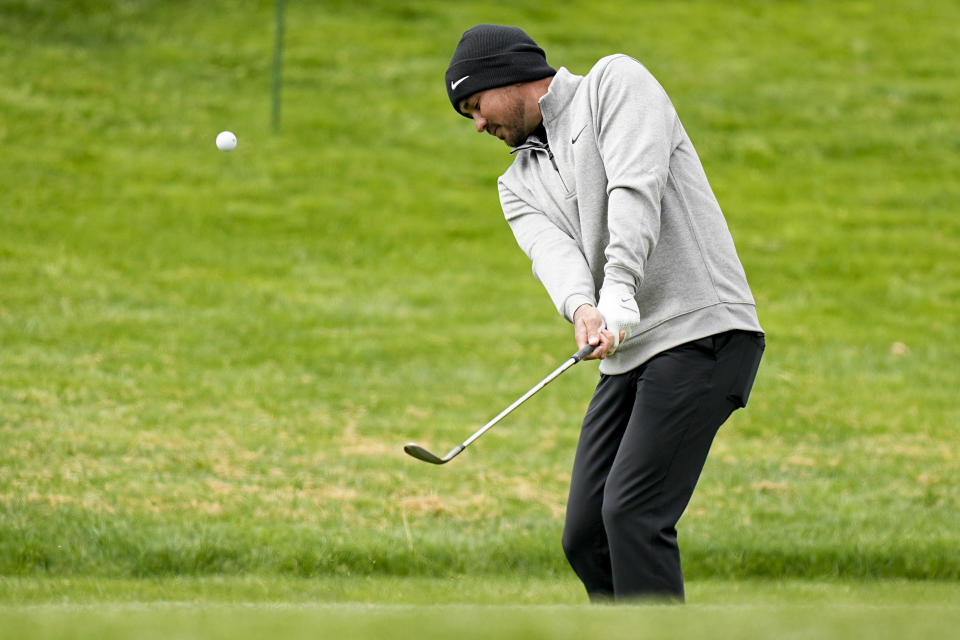 Jason Day, of Australia, warms up on the driving range before a practice round for the PGA Championship golf tournament at Oak Hill Country Club on Wednesday, May 17, 2023, in Pittsford, N.Y. (AP Photo/Eric Gay)