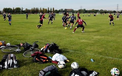 Jumpers for goalposts: players in action at Hackney Marshes - Credit: Getty 