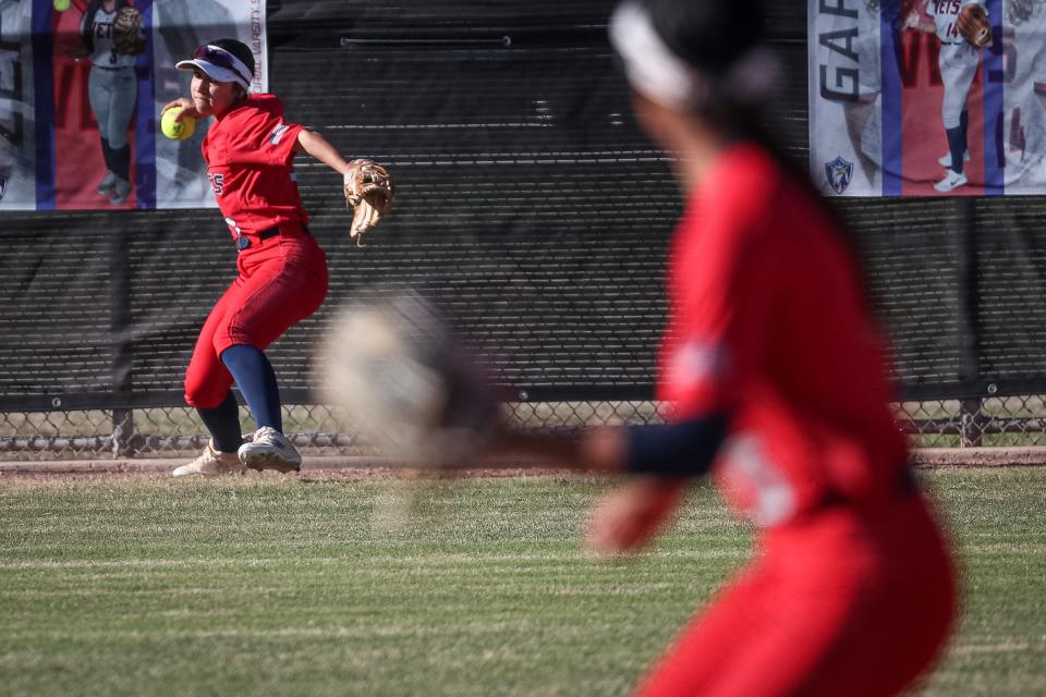 Veterans Memorial center fielder Jada Zepeda fields a hit to the outfield on March 3, 2023, at Veterans Memorial High School in Corpus Christi. 