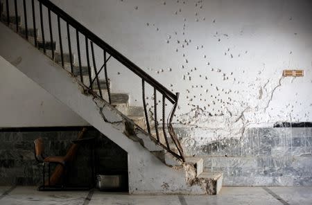 A general view of a wall with shrapnel-scars, which witnesses said was damaged in a suicide blast on January 2015, in a Shi'ite mosque in Shikarpur, Pakistan March 19, 2017. Picture taken March 19, 2017. REUTERS/Akhtar Soomro