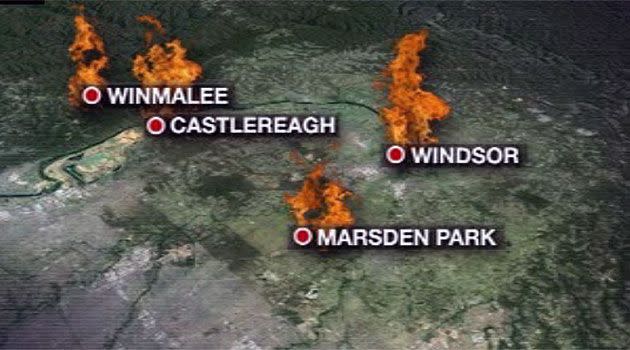 Bushfires are threatening dozens of homes in western Sydney as hot temperatures and strong winds feed the flames. Photo: 7News