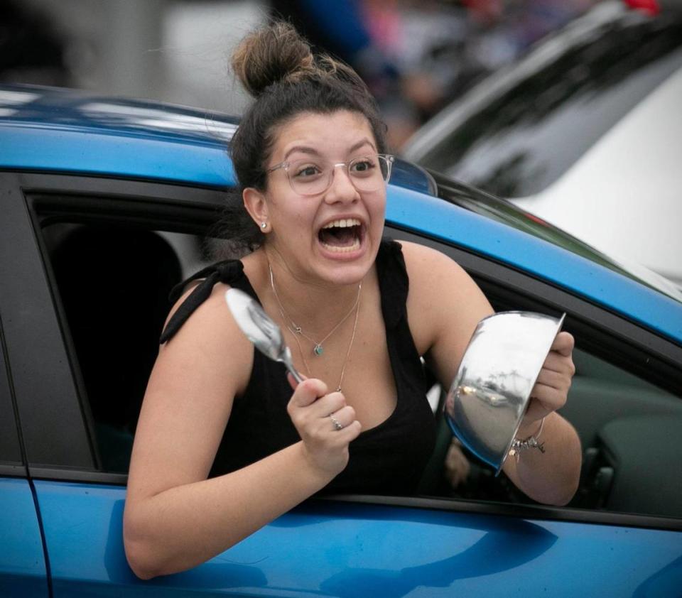 Celebrations break out along Biscayne Blvd after Joe Biden wins the presidency over President Trump in Miami on Saturday, November 7, 2020.