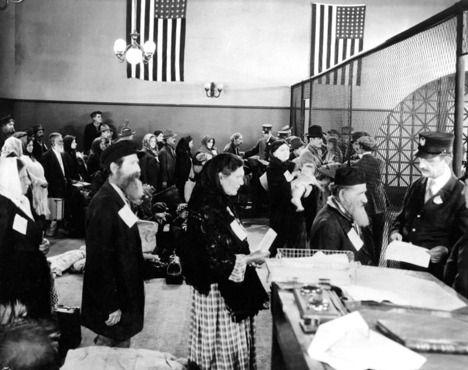 Jewish immigrants arriving at the immigration office on Ellis Island in New York City, around 1910. <a href="https://www.gettyimages.com/detail/news-photo/jewish-immigrants-arriving-at-immigration-office-in-ellis-news-photo/89857923?adppopup=true" rel="nofollow noopener" target="_blank" data-ylk="slk:Apic/Getty Images;elm:context_link;itc:0;sec:content-canvas" class="link ">Apic/Getty Images</a>