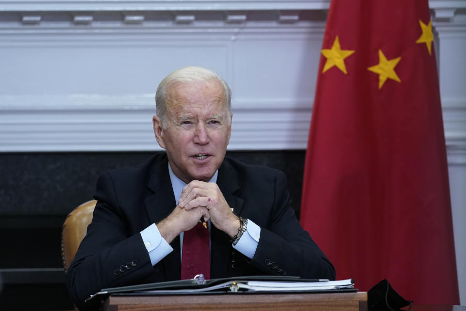 FILE - President Joe Biden speaks as he meets virtually with Chinese President Xi Jinping from the Roosevelt Room of the White House in Washington, Nov. 15, 2021. The Biden administration has invited Taiwan to its upcoming Summit for Democracy, prompting sharp criticism from China, which considers the self-ruled island as its territory. The invitation list features 110 countries, including Taiwan, but does not include China or Russia. (AP Photo/Susan Walsh, File)