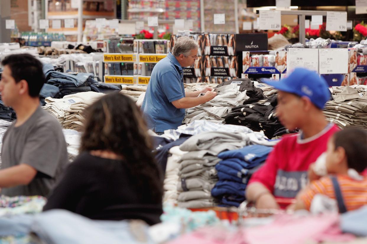 Shoppers browse the clothing selection at a Costco Store May 26, 2005 in Chicago, Illinois.