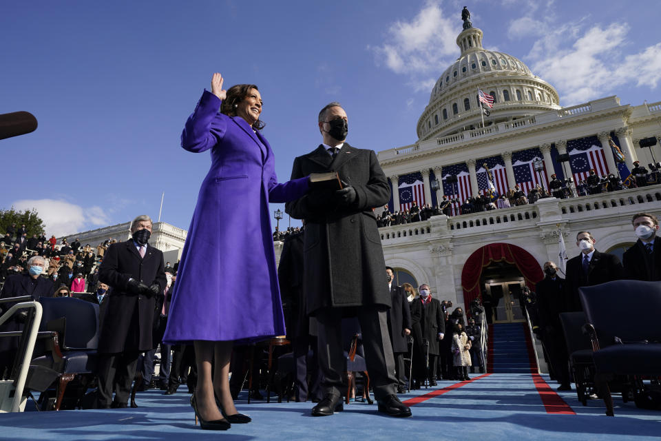 FILE - Kamala Harris is sworn in as Vice President by Supreme Court Justice Sonia Sotomayor as her husband Doug Emhoff holds the Bible during the 59th Presidential Inauguration at the U.S. Capitol in Washington, Jan. 20, 2021. (AP Photo/Andrew Harnik, Pool, File)