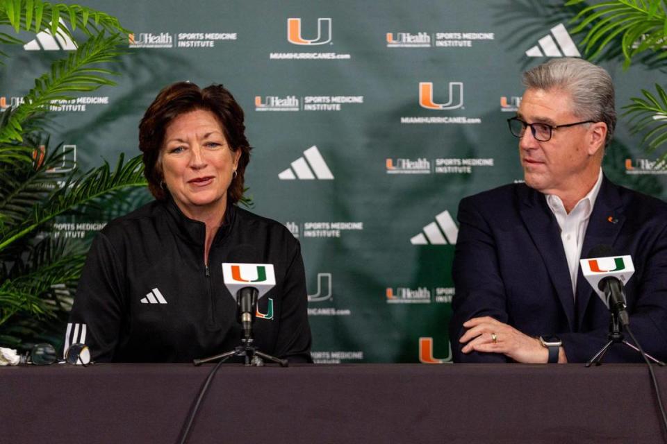 University of Miami Women’s Head Coach Katie Meier answers questions from the media alongside UM Athletic Director Dan Radakovich after she delivered her retirement speech during a press conference at Watsco Center in Coral Gables on Friday, March 22, 2024.