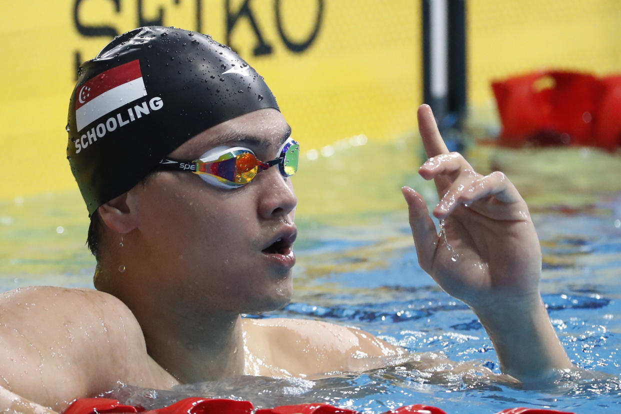 Singapore’s Joseph Schooling gestures after competing in the Men’s 100- Meter Freestyle Swimming final of the 29th South East Asian Games in Kuala Lumpur, Malaysia, Thursday, Aug. 24, 2017. (AP Photo/Vincent Thian)