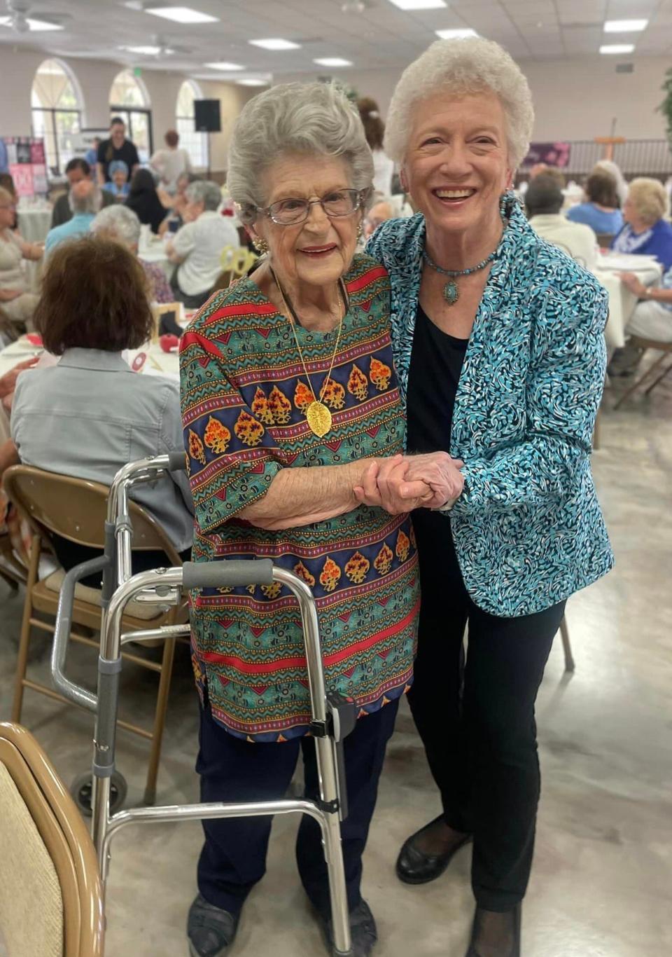 Retired school teacher June Edith Langer, left, of Apple Valley celebrates her 100th birthday with friends and family.