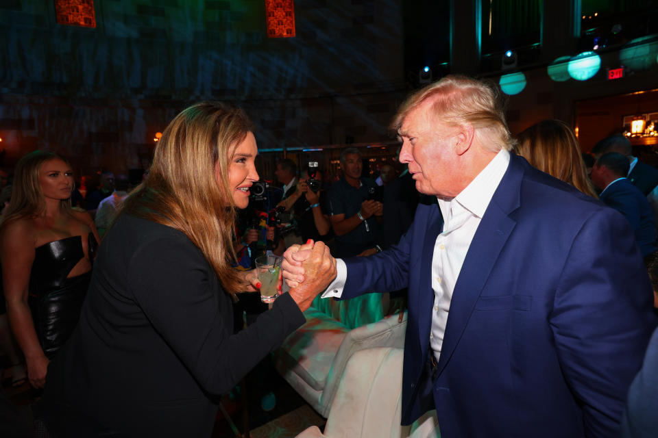 Caitlyn Jenner shakes hands with former U.S. President Donald Trump before the LIV Golf event in New Jersey