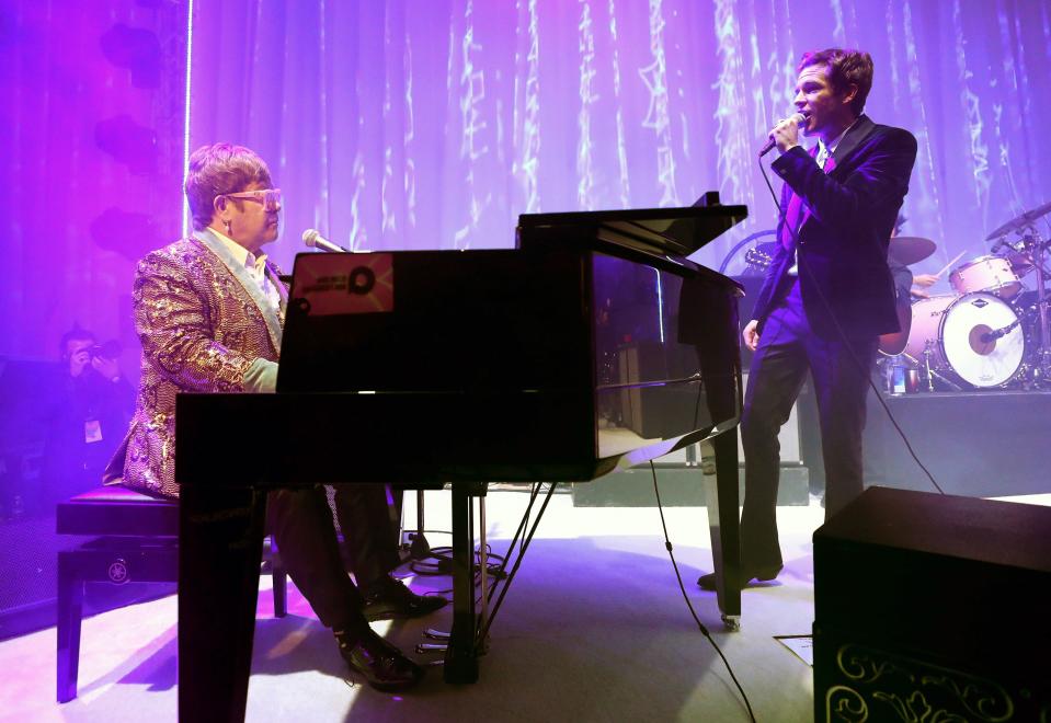 <h1 class="title">Sir Elton John and Taron Egerton performing</h1><cite class="credit">Photo: Getty Images</cite>