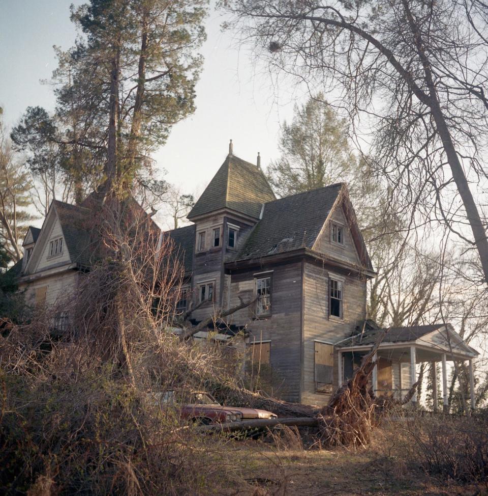 The exterior of an abandoned house.