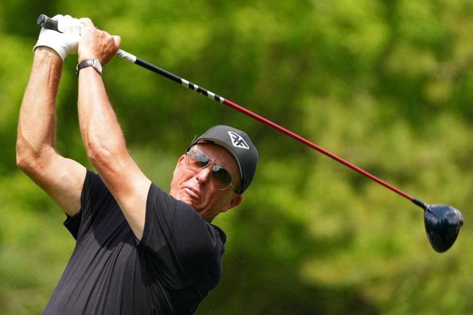 Phil Mickelson tees off on the fifth hole during the first round of The Masters.