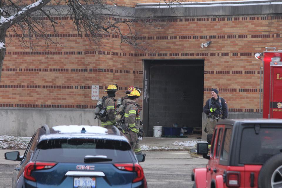 Firefighters prepare to leave the former Walter French Junior High School after a fire on January 23, 2023.