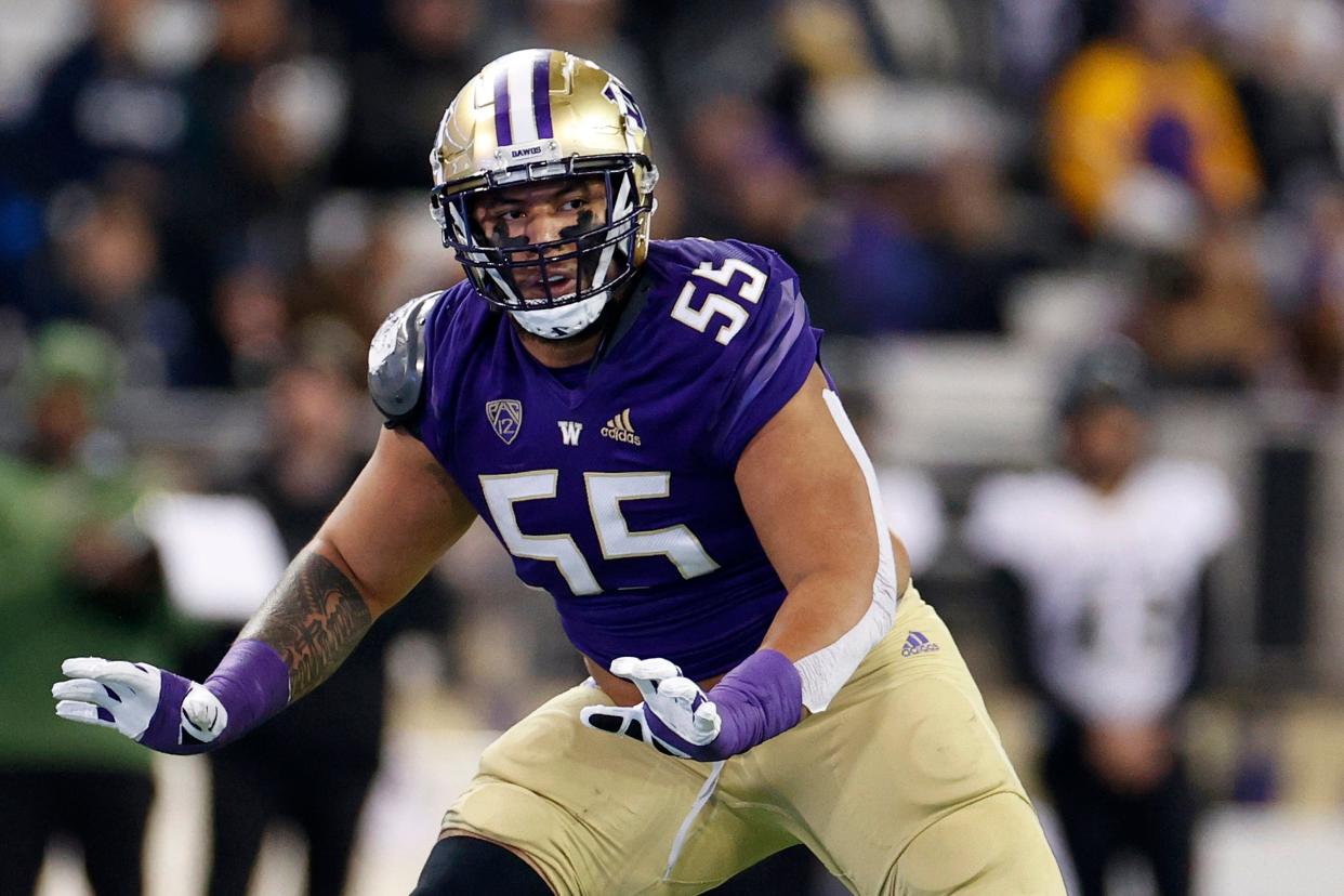 SEATTLE, WASHINGTON - NOVEMBER 19: Troy Fautanu #55 of the Washington Huskies in action during the first quarter against the Colorado Buffaloes at Husky Stadium on November 19, 2022 in Seattle, Washington. (Photo by Steph Chambers/Getty Images)