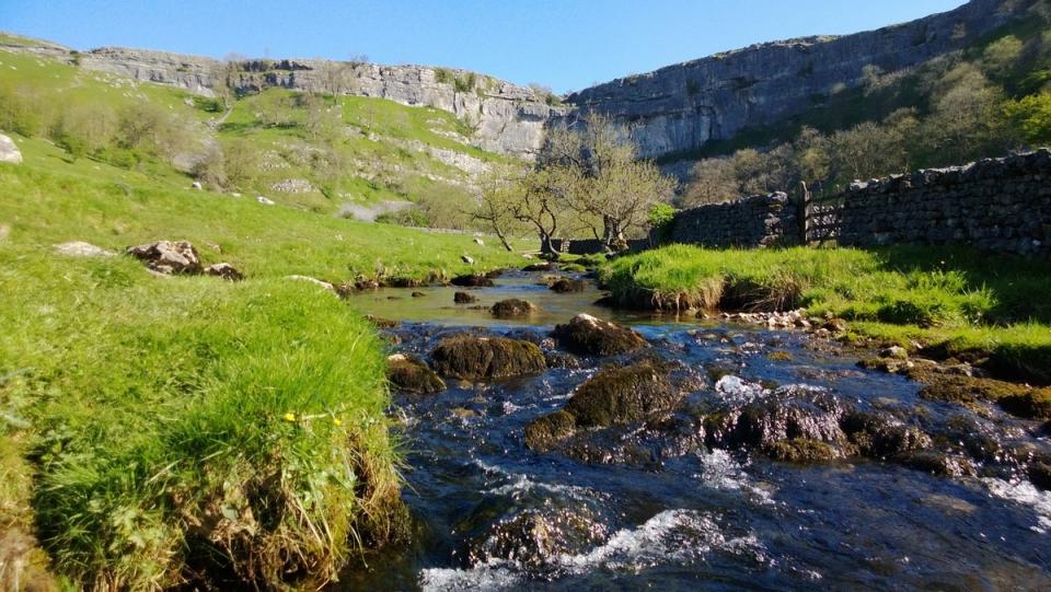 Water under the cliffs at Malham Cove (Getty Images)