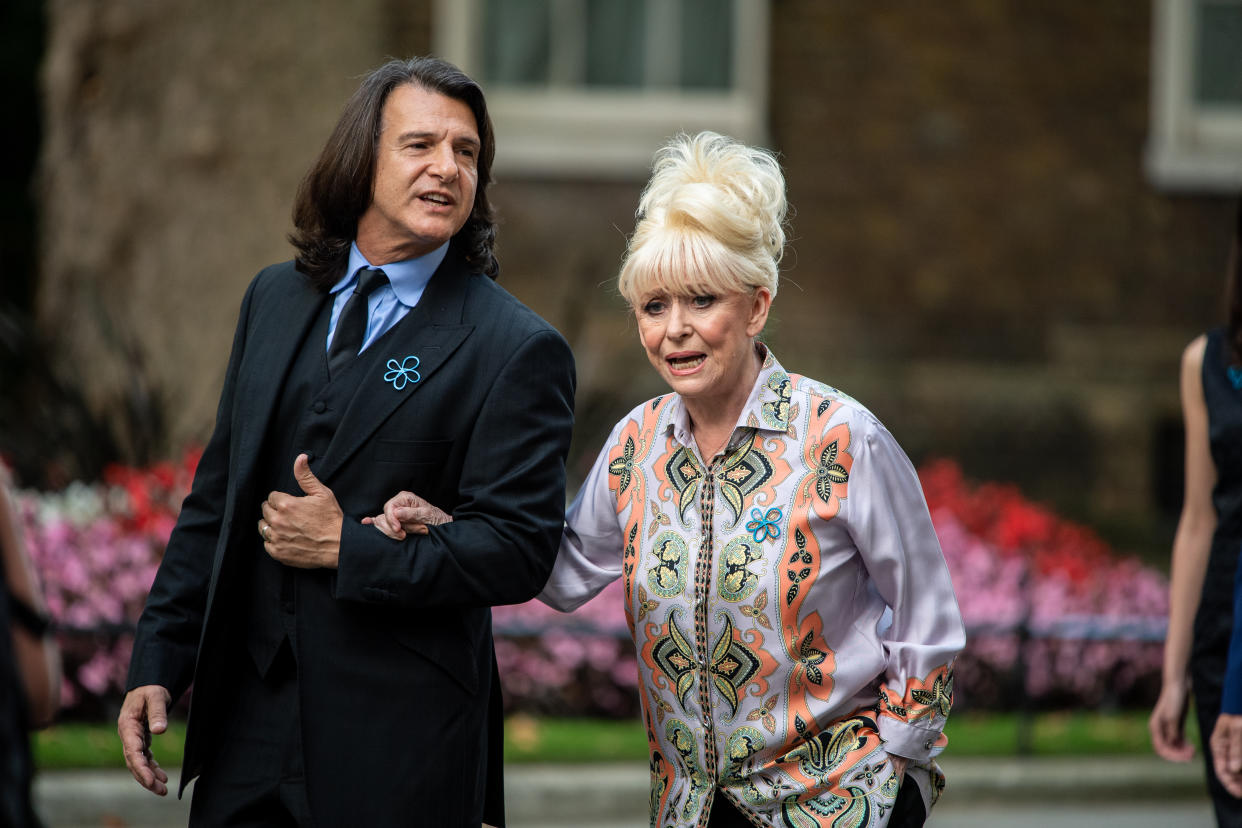 Dame Barbara Windsor arrives at 10 Downing Street with her husband Scott Mitchell on September 2, 2019 in London, England. Barbara Windsor, who suffers from Alzheimers, met with the Prime Minister at 10 Downing Street to discuss dementia care. (Photo by Chris J Ratcliffe/Getty Images)