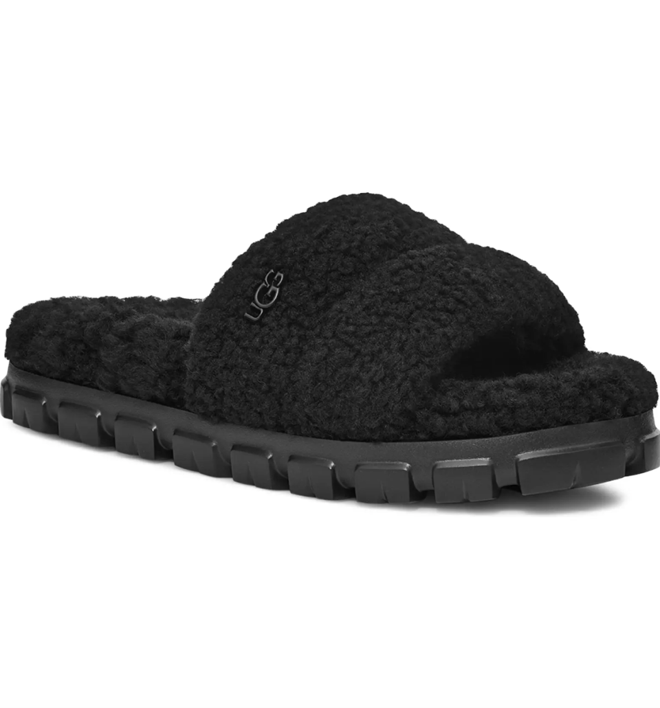 Ugg Cozetta Curly Genuine Shearling Slide Slipper in black (Photo via Nordstrom)