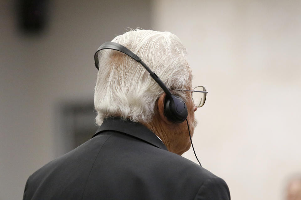 Ruben Flores listens as a judge acquits him during his trial in Monterey County Superior Court on Tuesday, Oct. 18, 2022, in Salinas, Calif. The jury acquitted Flores of helping his son, Paul Flores, cover up the murder of Cal Poly student Kristin Smart. (Laura Dickinson/The Tribune via AP, Pool)