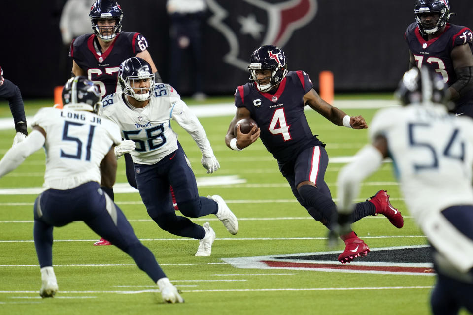 Houston Texans quarterback Deshaun Watson (4) runs for a gain as Tennessee Titans' Harold Landry III (58) and David Long Jr. (51) defend during the second half of an NFL football game Sunday, Jan. 3, 2021, in Houston. (AP Photo/Sam Craft)