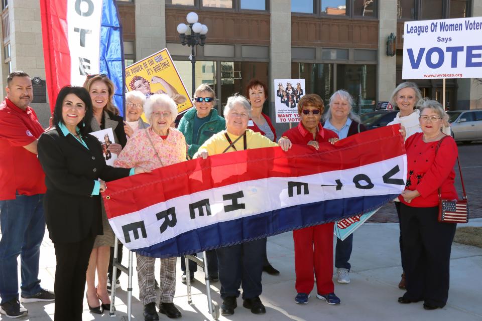 Members of the Amarillo chapter of the League of Women Voters gather at the Santa Fe Building to celebrate the organization's 102nd anniversary in this February file photo. The group has been working to help voters register and will be hosting events up until and through the Tuesday deadline.