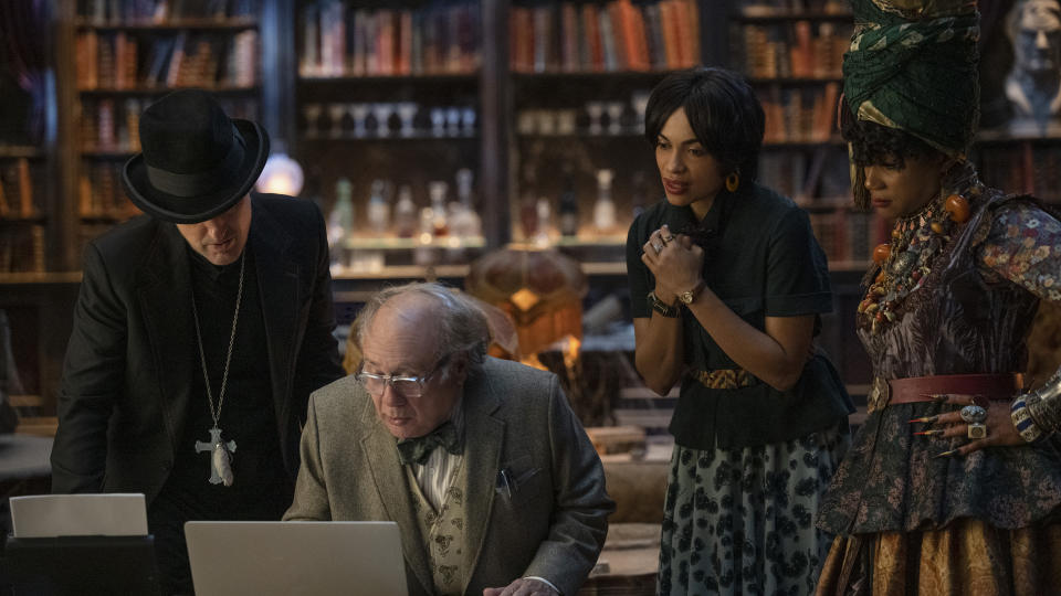 This image released by Disney Enterprises shows, from left, Owen Wilson, Danny DeVito, Rosario Dawson and Tiffany Haddish in a scene from "Haunted Mansion." (Jalen Marlowe/Disney Enterprises via AP)