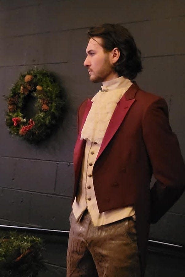 Mr. Darcy (Justin Marlow) arrives at the party during the Dec. 10 performance of Oklahoma Shakespeare in the Park's original interactive holiday show "Jane Austen's Christmas Cracker" in Oklahoma City's Paseo Arts District.