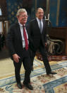 U.S. National Security Adviser John Bolton, left, and Russian Foreign Minister Sergey Lavrov enter a hall for their talks in Moscow, Russia, Monday, Oct. 22, 2018. U.S. President Donald Trump's national security adviser has met with top Russian officials after Trump declared he intended to pull out of a 1987 nuclear weapons treaty. (Russian Foreign Ministry Press Service via AP)