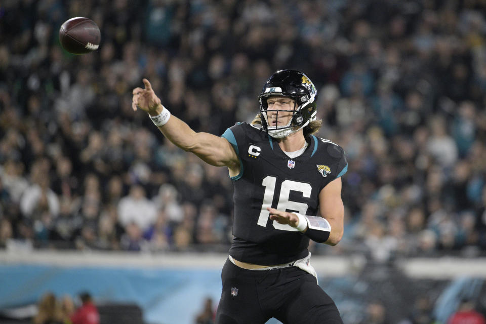 Jacksonville Jaguars quarterback Trevor Lawrence (16) throws a pass during the second half of an NFL football game against the Cincinnati Bengals, Monday, Dec. 4, 2023, in Jacksonville, Fla. (AP Photo/Phelan M. Ebenhack)