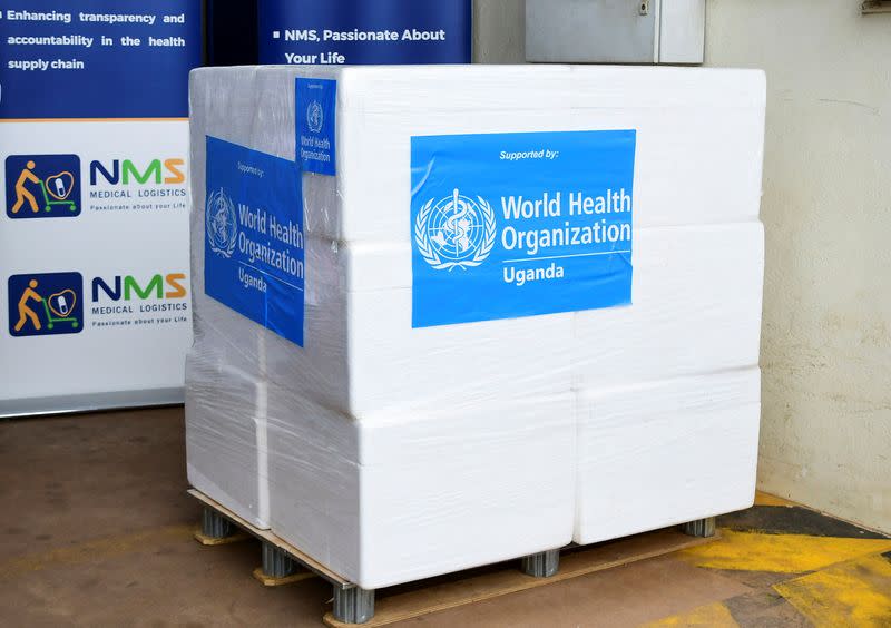 A consignment of 1,200 doses is placed on a pallet at the National Medical Stores (NMS) in Entebbe