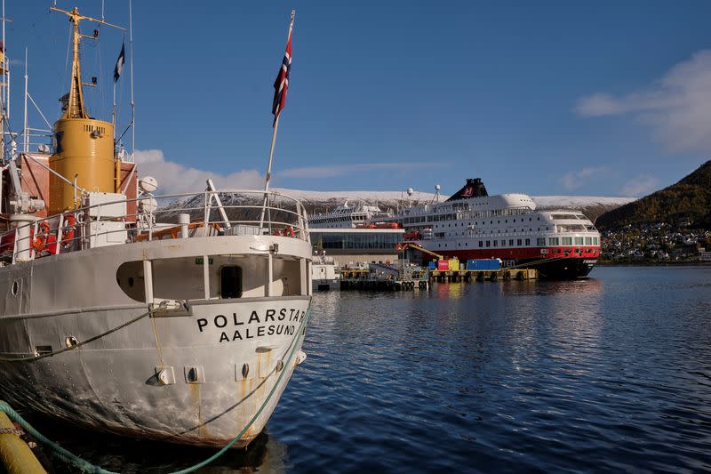 FILE PHOTO: Arctic tour ship MS Polarstar and Norwegian coastal ship MS Finnmarken are seen in the port in Tromso