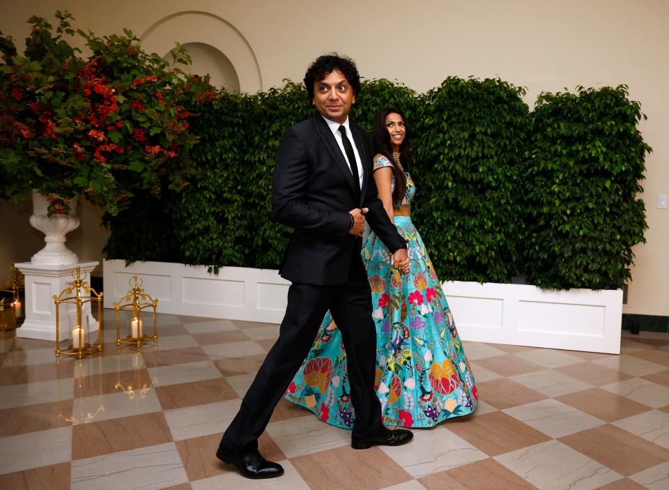 Director M. Night Shyamalan and Dr. Bhavna Shyamalan arrive at the White House on June 22, 2023 in Washington, DC. President Joe Biden and first lady Jill Biden are hosting a state dinner for Indian Prime Minister Narendra Modi as part of his official state visit.