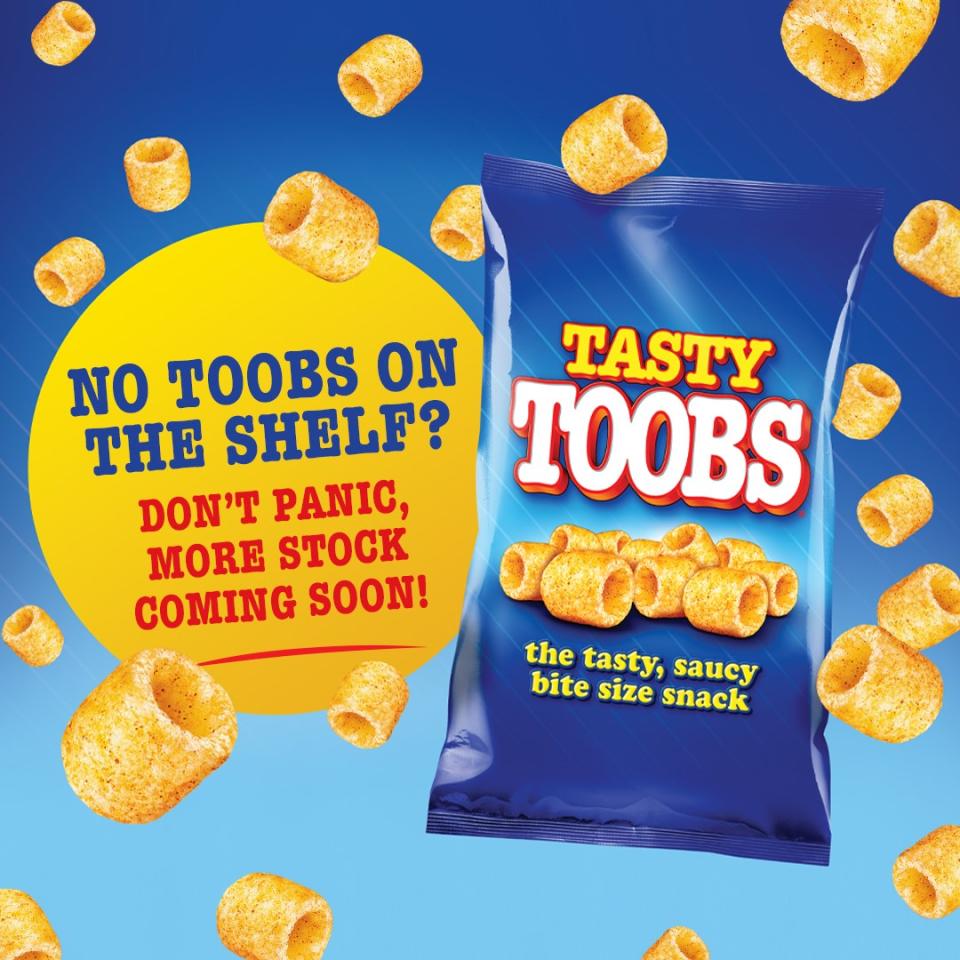 A Smith's poster saying new stock of Tasty Toobs will be available soon.