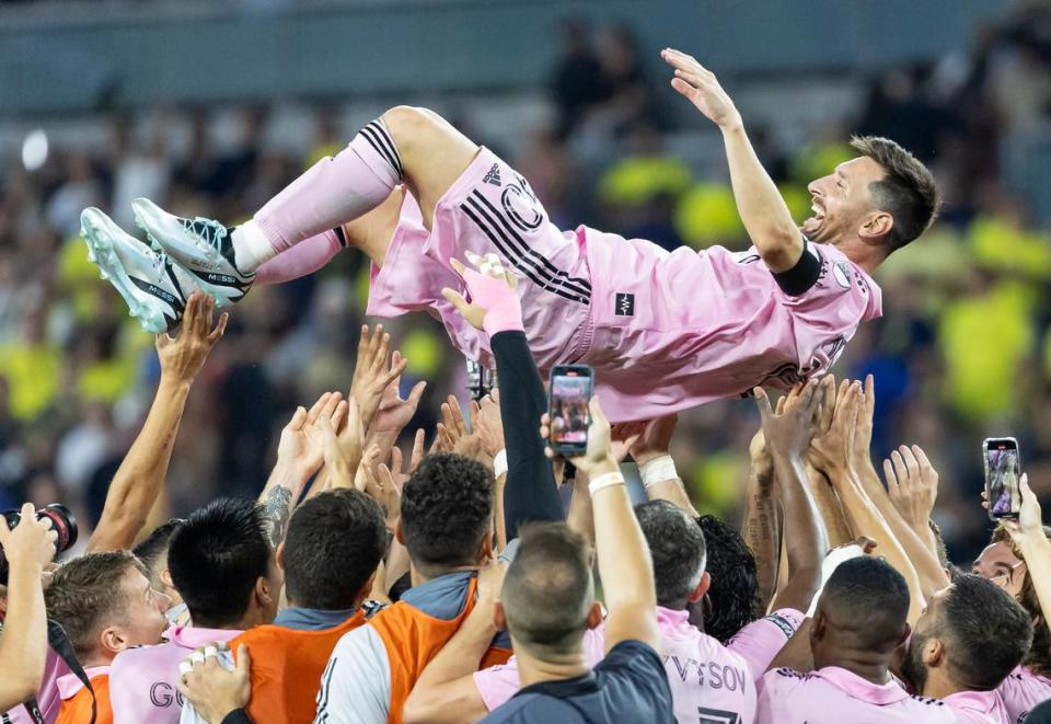 Inter Miami players lift forward Lionel Messi after they defeated Nashville SC. Messi’s goal in the first half led Miami to its first-ever championship with the Leagues Cup trophy.