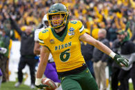 North Dakota State safety James Hendricks (6) smiles after scoring on a fake field goal attempt during the first half of the FCS championship NCAA college football game against James Madison, Saturday, Jan. 11, 2020, in Frisco, Texas. (AP Photo/Sam Hodde)